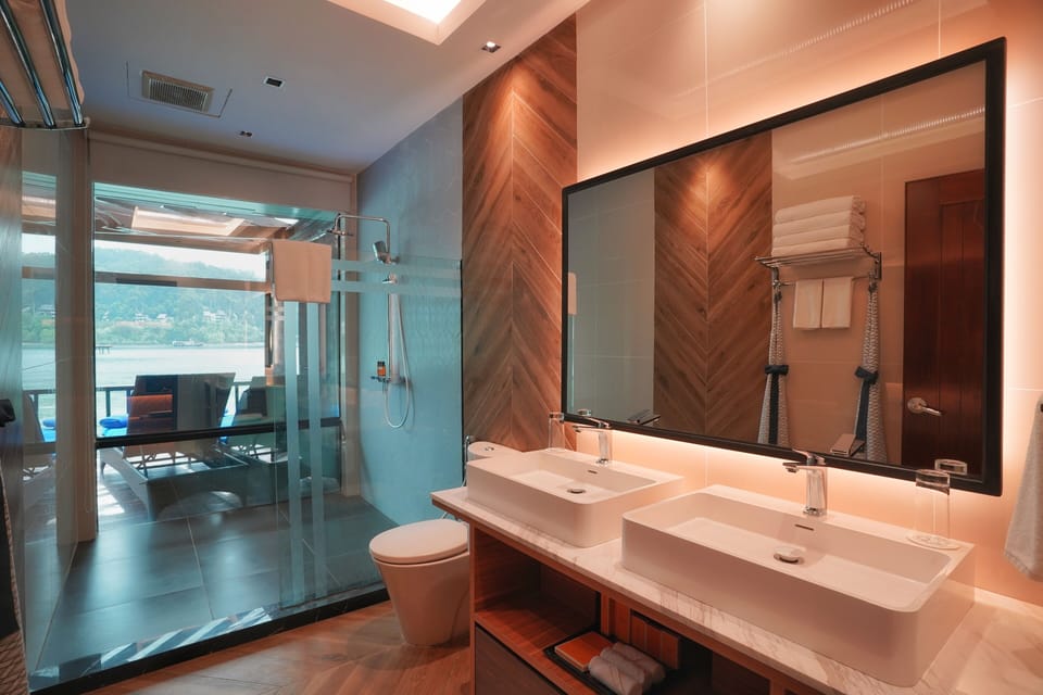 Ocean Villa | Bathroom | Designer toiletries, hair dryer, bathrobes, slippers