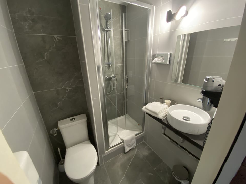 Shower, free toiletries, hair dryer, towels