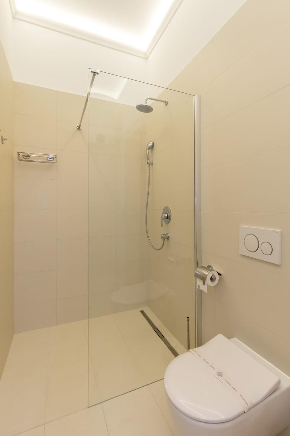 Shower, free toiletries, hair dryer, slippers