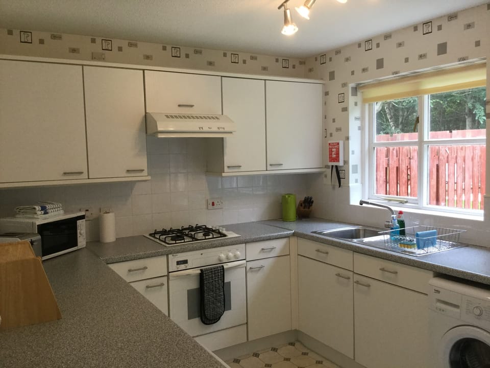 Apartment | Private kitchen | Full-size fridge, microwave, oven, stovetop