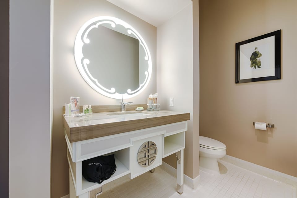 Combined shower/tub, free toiletries, hair dryer, slippers