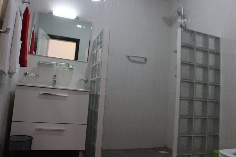 Deluxe Double Room, 1 Double Bed, Ocean View | Bathroom | Shower, bathrobes, slippers, towels