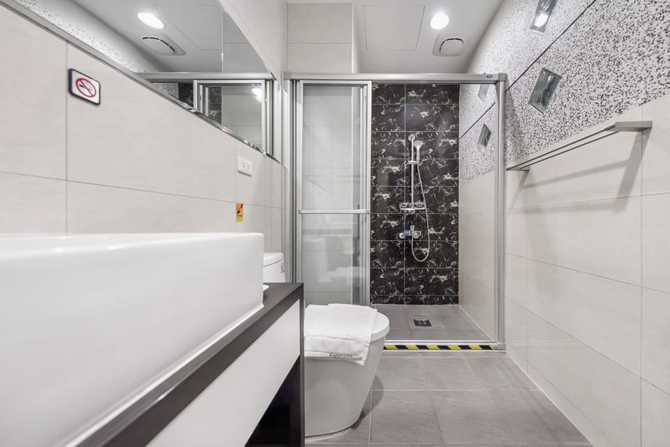 Quadruple Room, Mountain View | Bathroom | Shower, hair dryer, slippers, towels