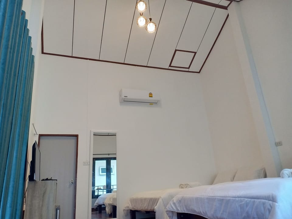 Family Quadruple Room, Patio, Mountainside | Premium bedding, blackout drapes, WiFi (free), bed sheets