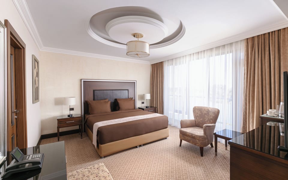 Premium Two Bedroom Suite | Minibar, in-room safe, desk, laptop workspace
