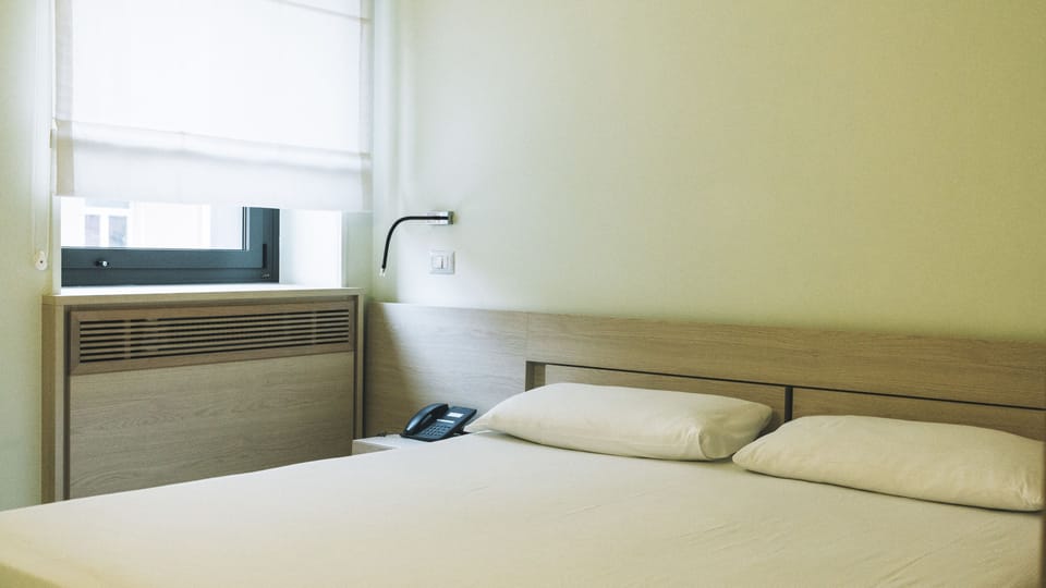 Standard Double or Twin Room | In-room safe, desk, blackout drapes, iron/ironing board