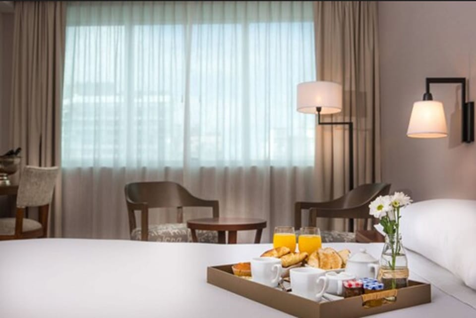 Premium bedding, down comforters, pillowtop beds, minibar
