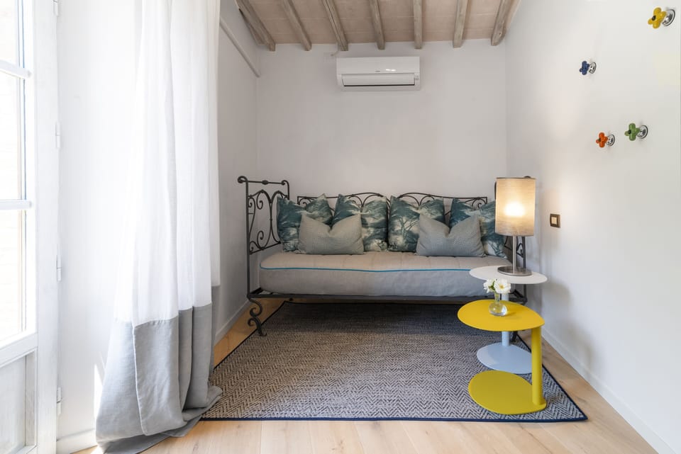 Junior Room | Living area | Flat-screen TV, table tennis, books