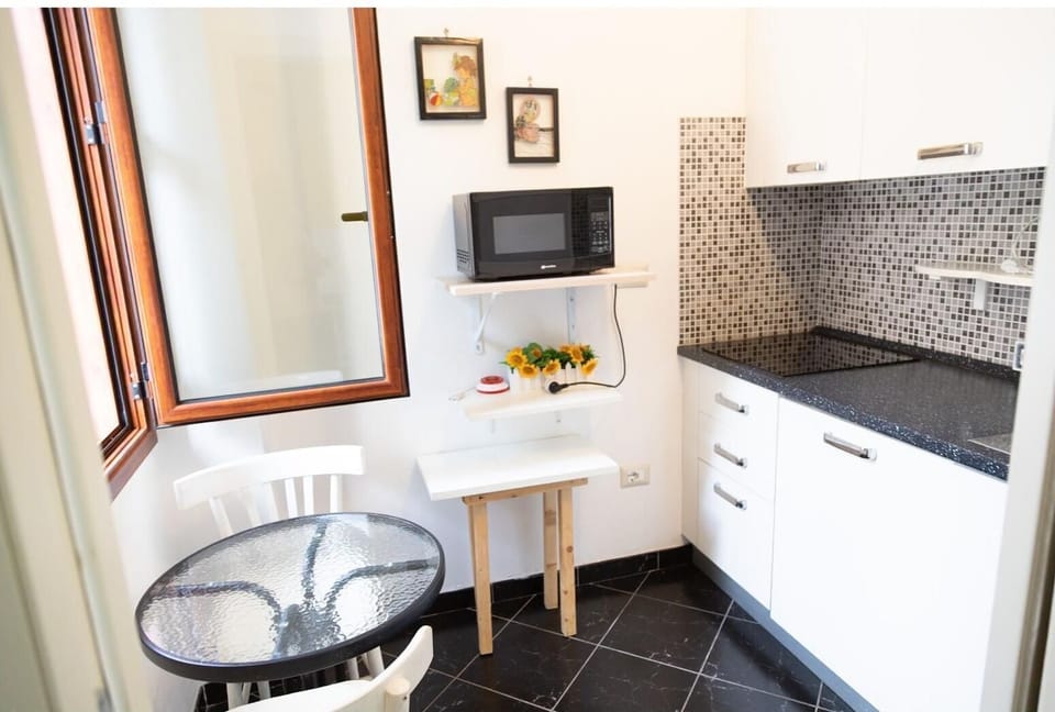 Triple Room, Kitchenette | In-room safe, soundproofing, free WiFi, bed sheets
