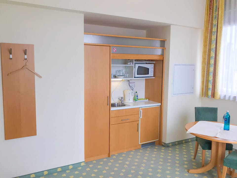 Luxury Suite | Private kitchenette | Coffee/tea maker, electric kettle