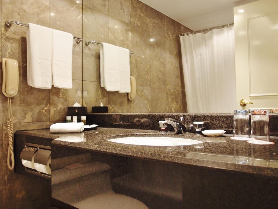 Shower, free toiletries, hair dryer, slippers