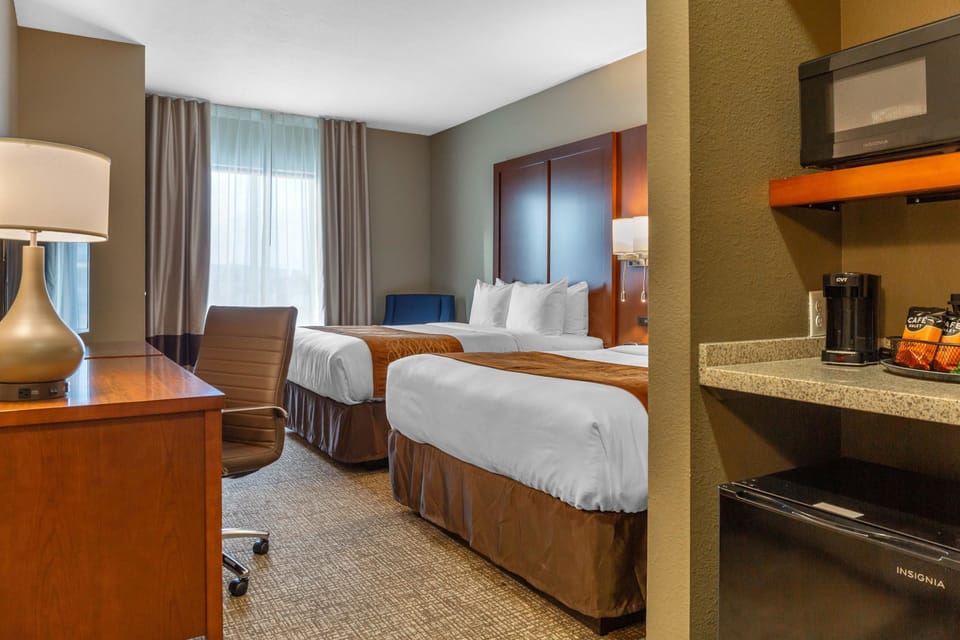 Premium bedding, desk, laptop workspace, free WiFi