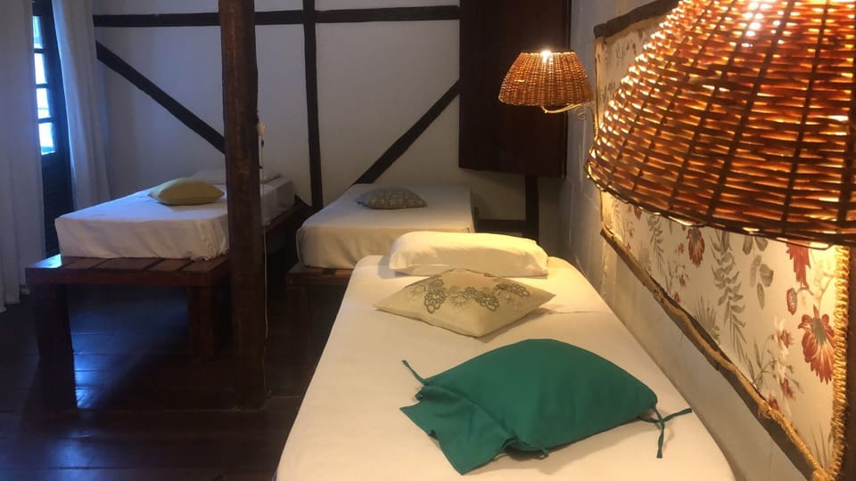 Triple Room | Desk, blackout drapes, free WiFi, bed sheets