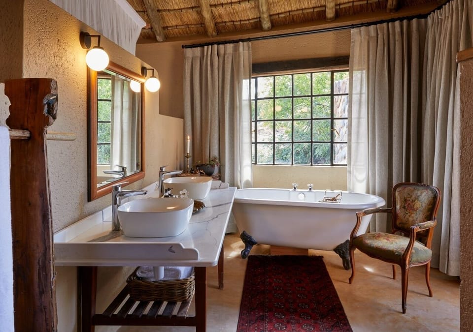 Modjadji Master Suite | Bathroom | Separate tub and shower, deep soaking tub, designer toiletries