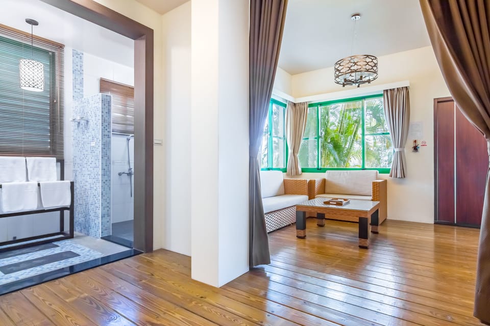 Family Townhome, Garden Area | Desk, blackout drapes, rollaway beds, free WiFi