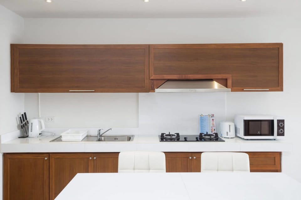 Villa | Private kitchen | Full-size fridge, microwave, stovetop, electric kettle