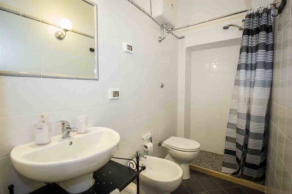 Deluxe Triple Room, 2 Bedrooms, Private Bathroom, Sea Facing | Bathroom | Shower, free toiletries, hair dryer, bidet