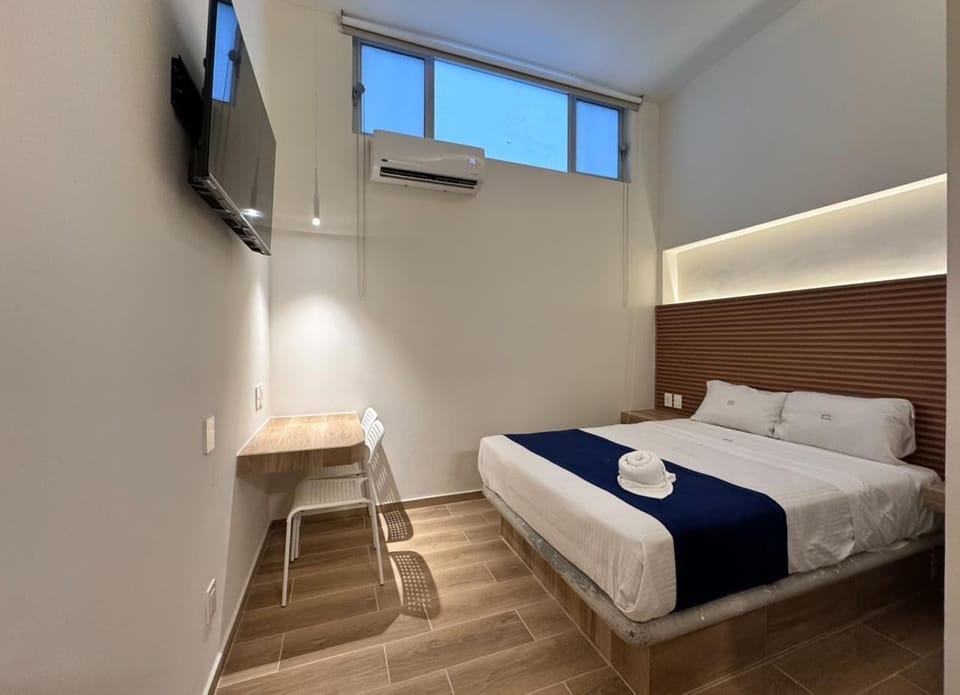 Deluxe Room | Desk, laptop workspace, iron/ironing board, free cribs/infant beds