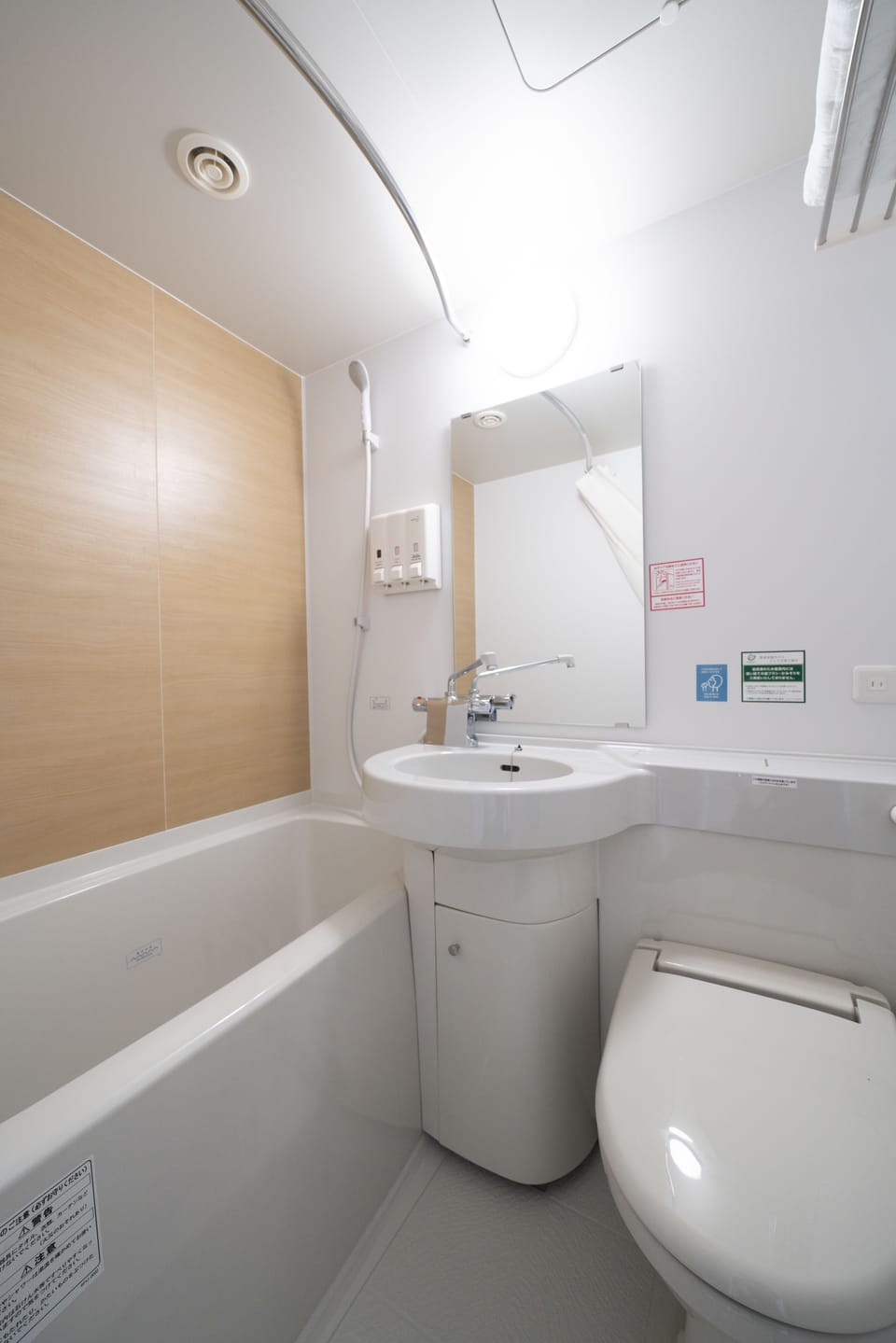Separate tub and shower, free toiletries, hair dryer, slippers
