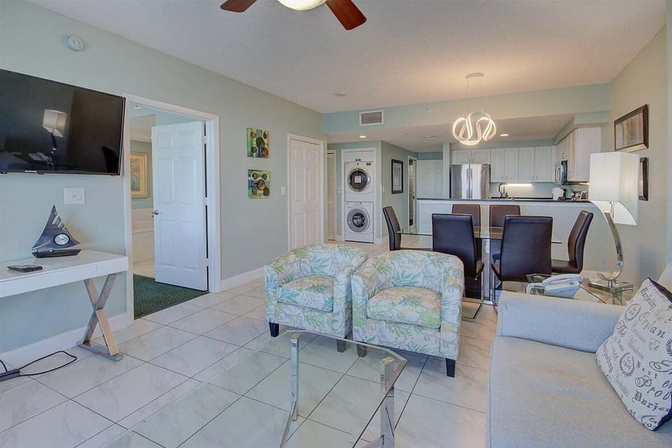 Living room with view to kitchen