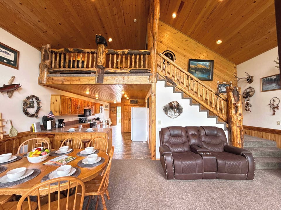 Adjacent to the living room is the dining table and kitchen.