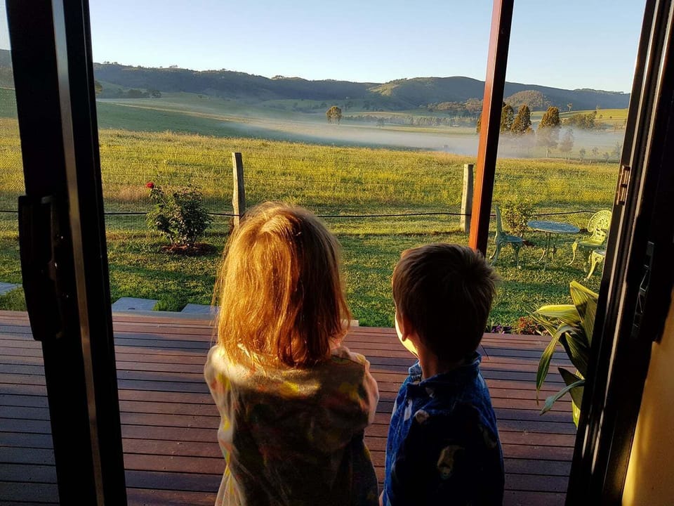 Children looking at the early morning mist and view!