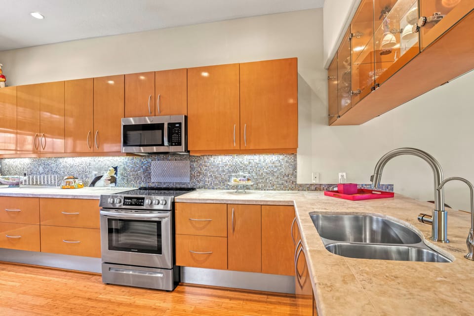 A sleek, functional double sink invites effortless meal prep and cleanup, blending style with convenience.