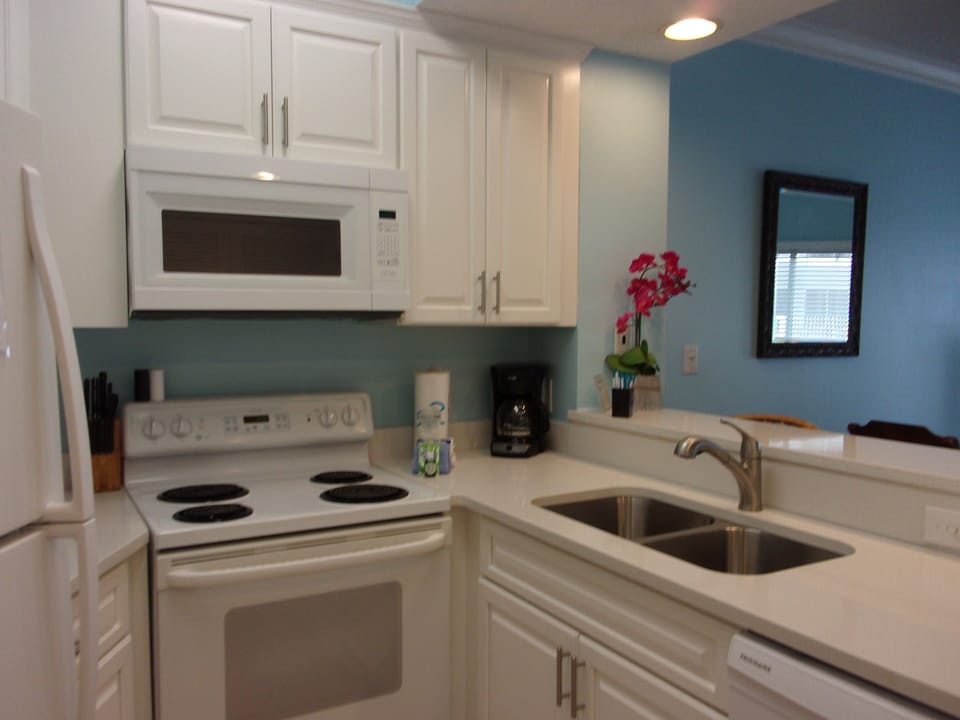 New cabinets with quartz counter tops.