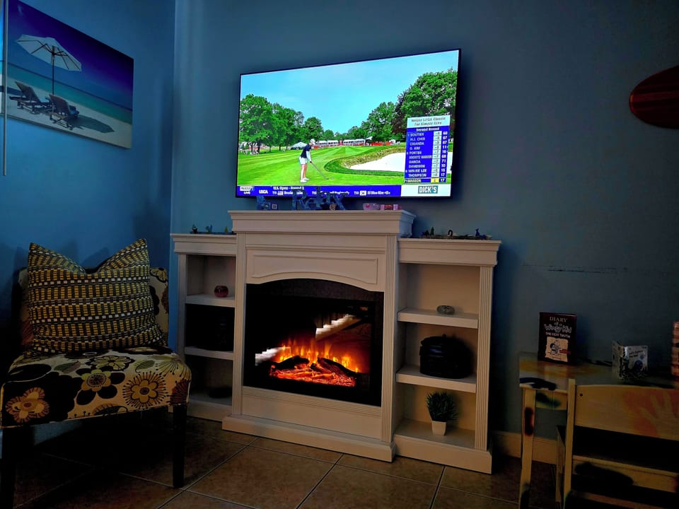 Enjoy your favorite show and cozy fireplace 