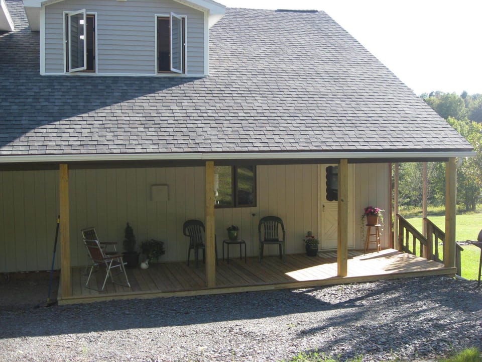 Back porch entry into the mud room. A nice space to relax while grilling.