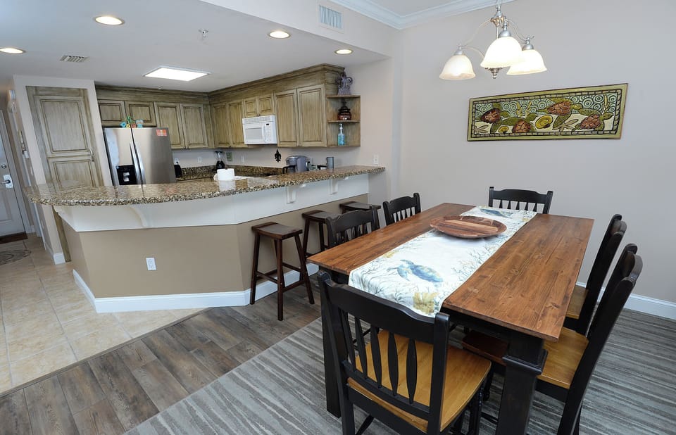 Dining area has full-sized dining table