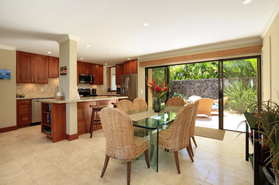 Renovation opened kitchen to living room & ocean view. Nicer than other units.
