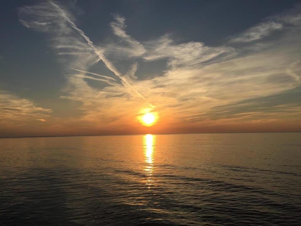 Enjoy beautiful Lake Michigan sunsets. 