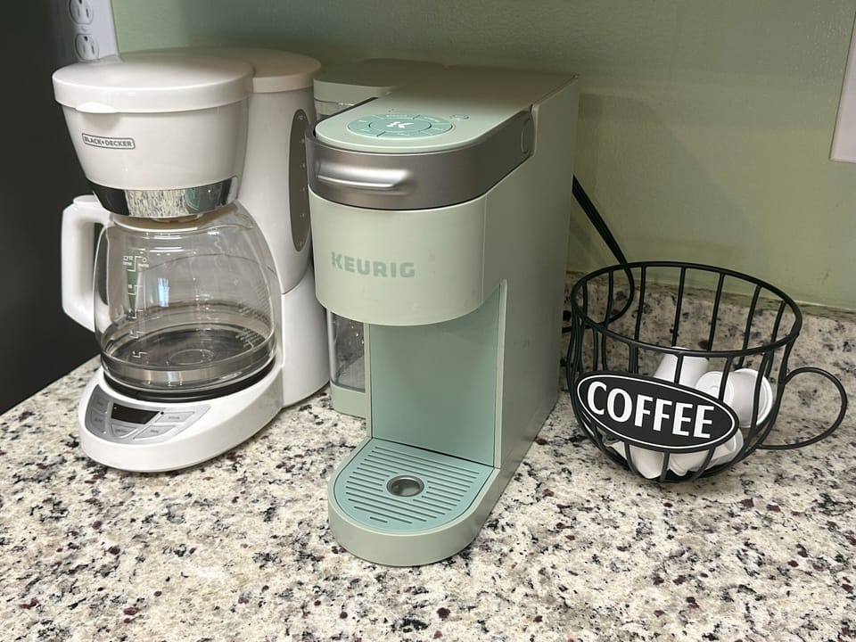 Keurig and coffee pot for your caffeinated enjoyment! Bring your own coffee.