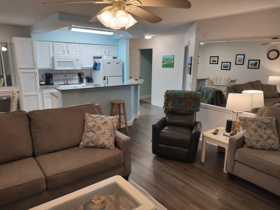 Living Room has a Couch, Loveseat, Recliner, Coffee Table and 2 End Tables.