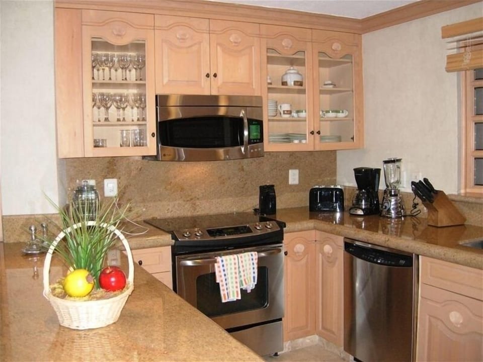Kitchen w/ Granite Counter Tops and New Stainless Steel Appliances