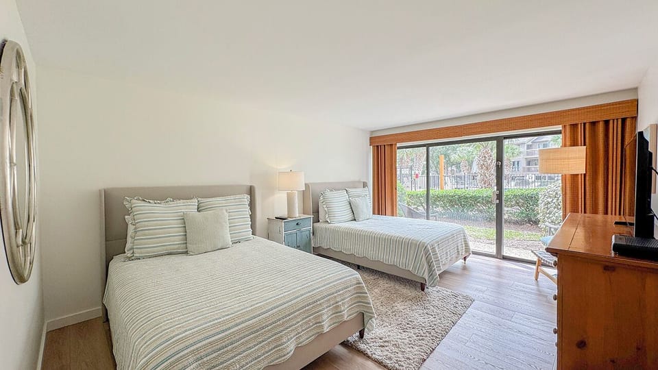 Bedroom 1 with Two Queen Size Beds