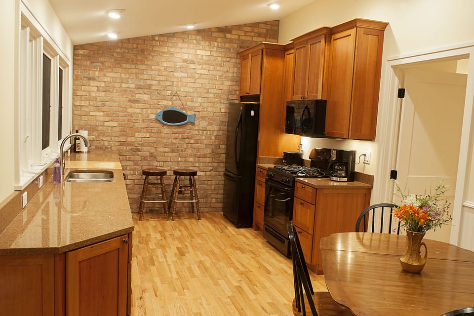 Kitchen is bright and updated .  All windows face the lake. 