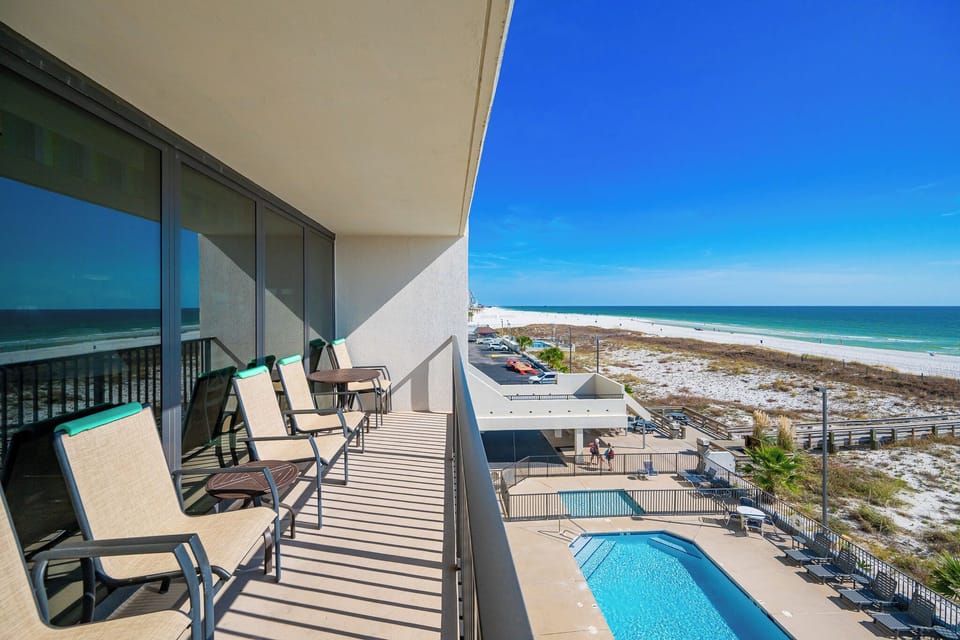 Savor the coastal vibe from your spacious balcony while lounging and enjoying refreshing sea breezes and stunning views