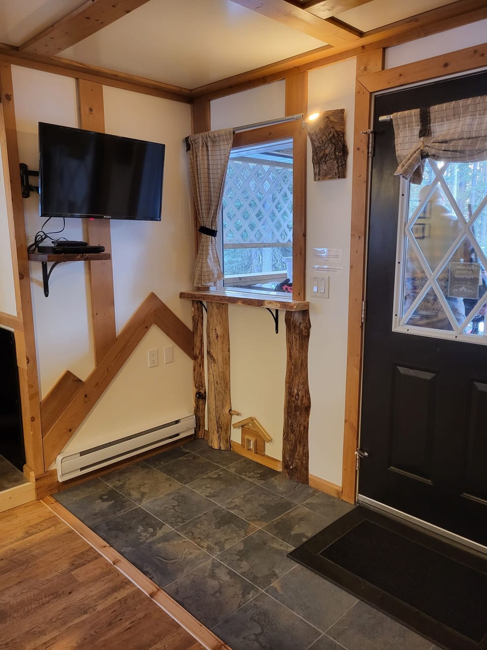 Front entry with swivel TV