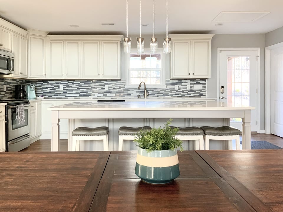 Large kitchen island to gather round. Fully stocked along with a Keurig.