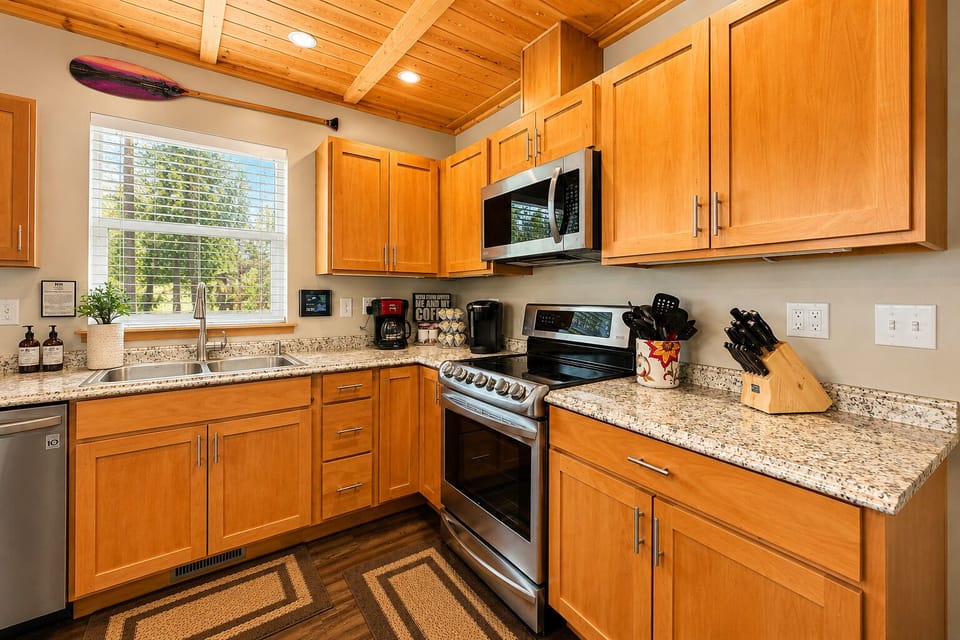 A warm, wood‑toned kitchen with modern appliances made for memorable meals together.