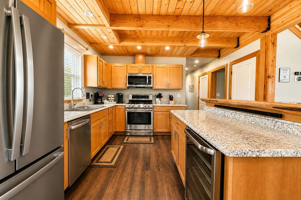 A warm, wood‑toned kitchen with modern appliances made for memorable meals together.