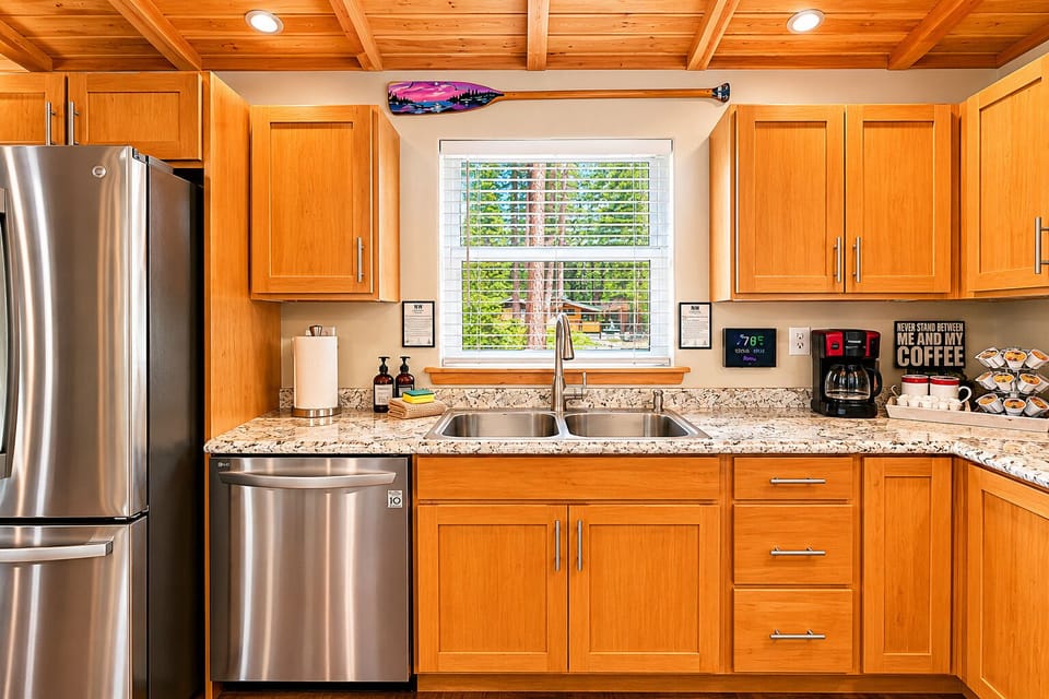 A warm, wood‑toned kitchen with modern appliances made for memorable meals together.