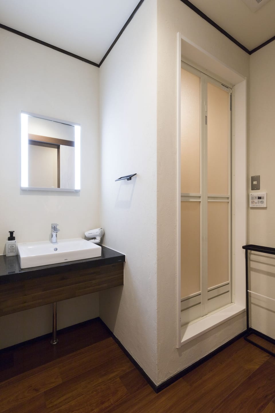 Shower, free toiletries, hair dryer, slippers
