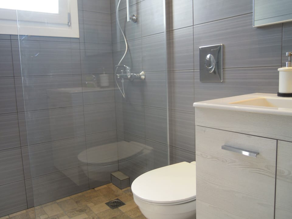 Double Room, Balcony, Sea View | Bathroom | Shower, free toiletries, hair dryer, towels