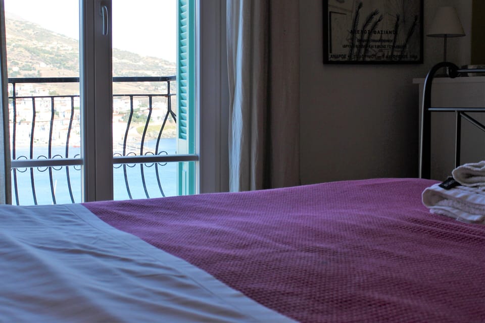 Superior Triple Room, Balcony, Sea View | Minibar, in-room safe, individually decorated, individually furnished