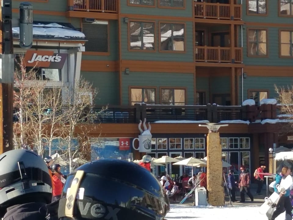 I am In the eagle lift line.The windows above the coffee cup is the condo.