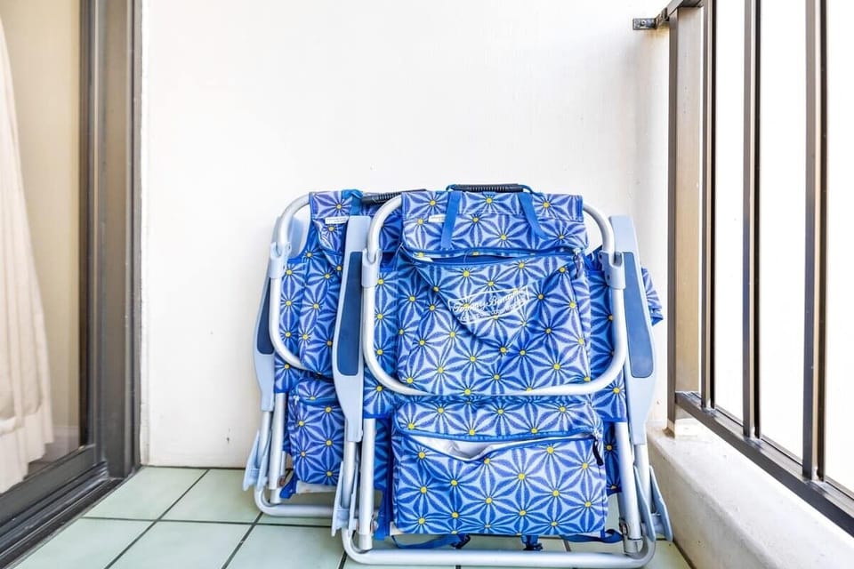 Two beach chairs and a beach umbrella are provided for guests' use!