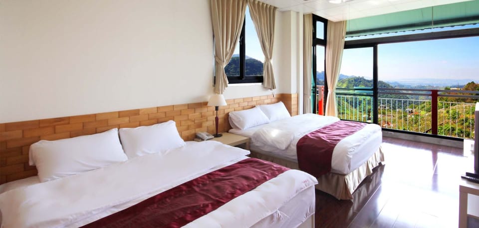 Deluxe Quadruple Room | Premium bedding, desk, blackout drapes, soundproofing